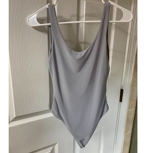 Gray tank body suit with open back